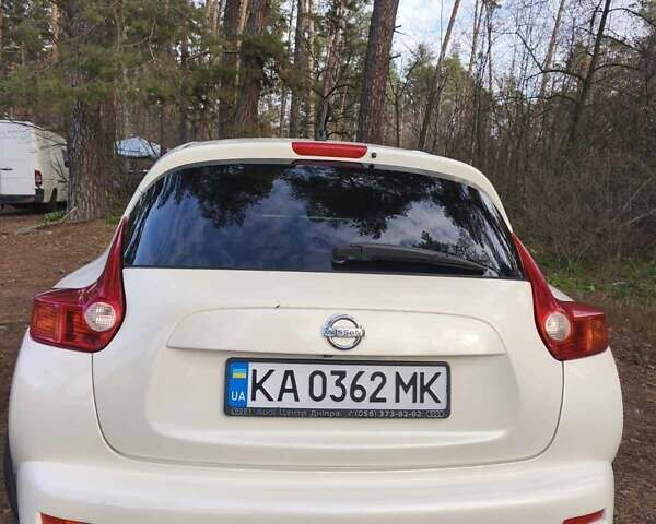 Белый Ниссан Жук, объемом двигателя 1.6 л и пробегом 170 тыс. км за 8900 $, фото 5 на Automoto.ua