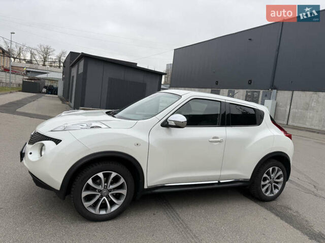 Белый Ниссан Жук, объемом двигателя 1.6 л и пробегом 64 тыс. км за 12700 $, фото 2 на Automoto.ua