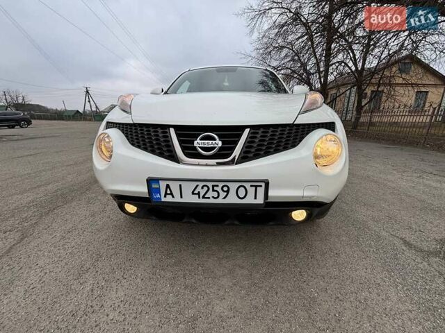 Белый Ниссан Жук, объемом двигателя 1.6 л и пробегом 124 тыс. км за 11000 $, фото 2 на Automoto.ua
