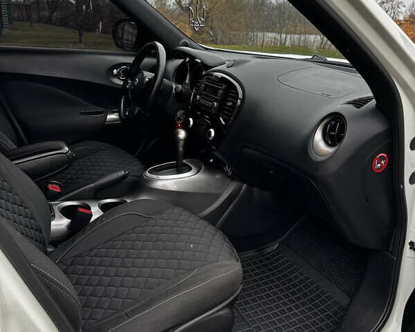 Белый Ниссан Жук, объемом двигателя 1.6 л и пробегом 92 тыс. км за 12999 $, фото 11 на Automoto.ua