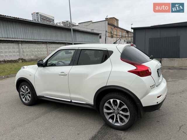 Белый Ниссан Жук, объемом двигателя 1.6 л и пробегом 64 тыс. км за 12700 $, фото 4 на Automoto.ua