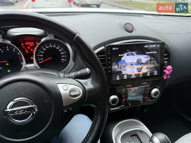 Белый Ниссан Жук, объемом двигателя 1.6 л и пробегом 106 тыс. км за 10400 $, фото 13 на Automoto.ua