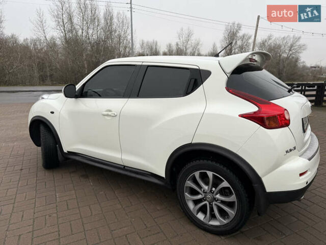 Белый Ниссан Жук, объемом двигателя 1.6 л и пробегом 106 тыс. км за 10400 $, фото 7 на Automoto.ua