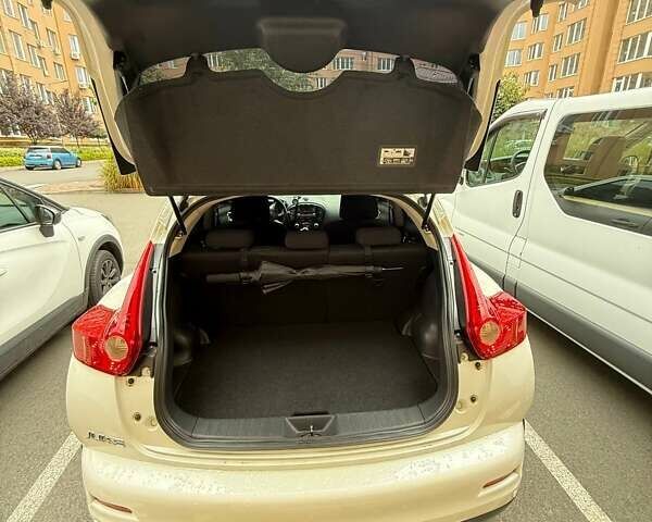 Белый Ниссан Жук, объемом двигателя 1.6 л и пробегом 175 тыс. км за 9500 $, фото 7 на Automoto.ua