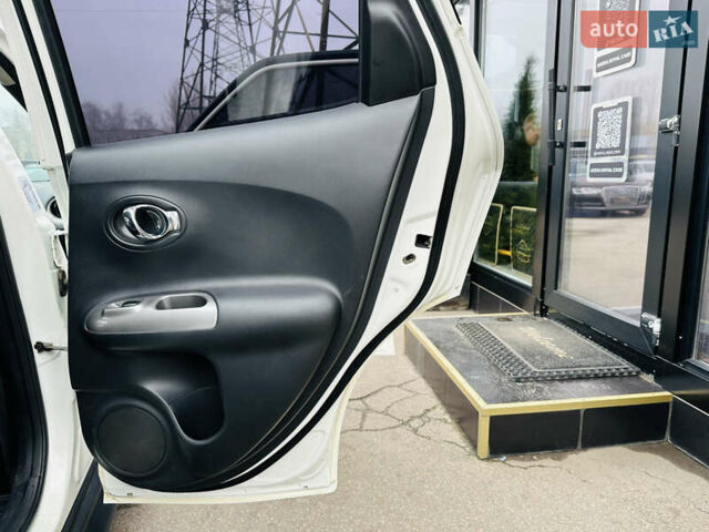 Белый Ниссан Жук, объемом двигателя 1.57 л и пробегом 106 тыс. км за 11500 $, фото 21 на Automoto.ua