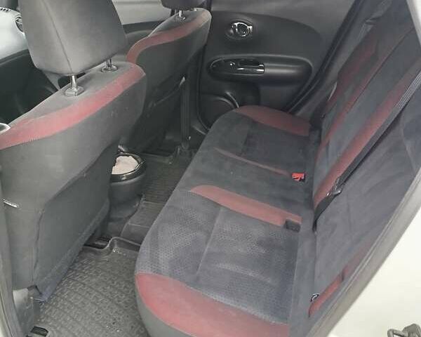 Белый Ниссан Жук, объемом двигателя 1.62 л и пробегом 124 тыс. км за 11100 $, фото 2 на Automoto.ua