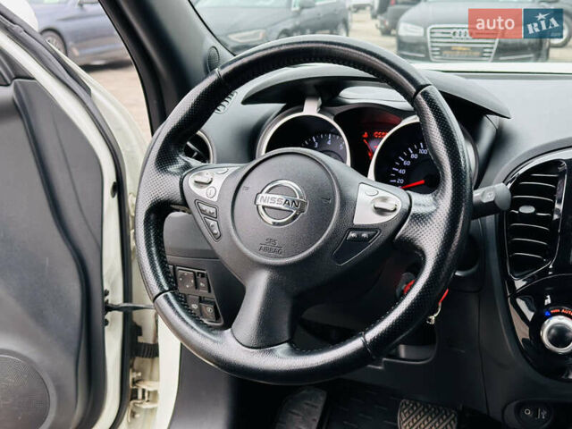 Белый Ниссан Жук, объемом двигателя 1.57 л и пробегом 106 тыс. км за 11500 $, фото 20 на Automoto.ua