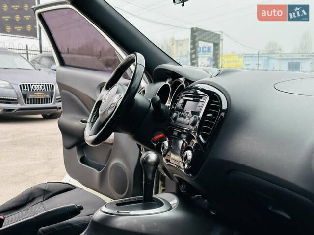 Белый Ниссан Жук, объемом двигателя 1.57 л и пробегом 106 тыс. км за 11500 $, фото 23 на Automoto.ua