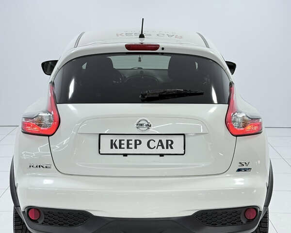 Белый Ниссан Жук, объемом двигателя 1.6 л и пробегом 140 тыс. км за 9900 $, фото 9 на Automoto.ua