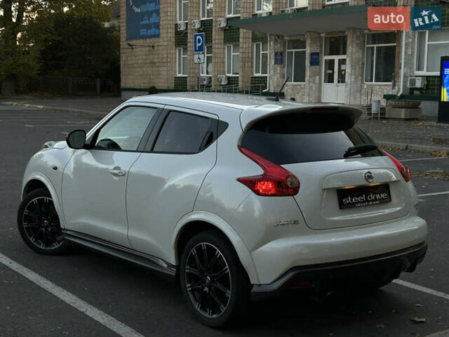 Белый Ниссан Жук, объемом двигателя 1.6 л и пробегом 113 тыс. км за 12699 $, фото 7 на Automoto.ua