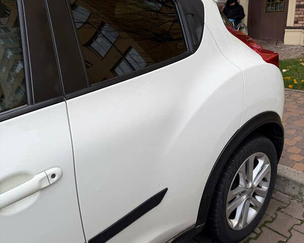 Белый Ниссан Жук, объемом двигателя 1.6 л и пробегом 130 тыс. км за 11600 $, фото 15 на Automoto.ua