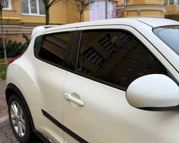 Белый Ниссан Жук, объемом двигателя 1.6 л и пробегом 130 тыс. км за 11600 $, фото 28 на Automoto.ua