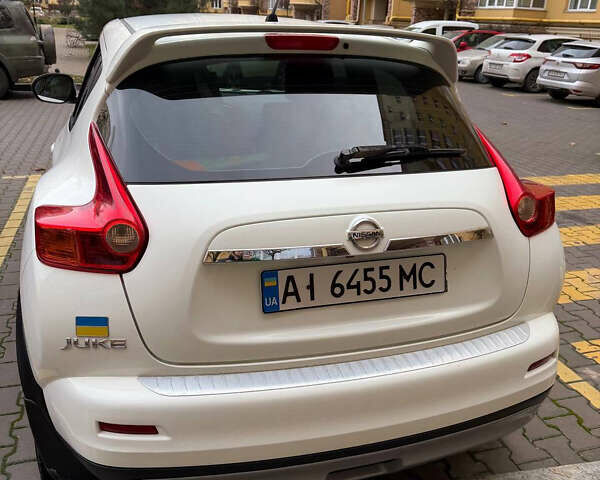 Белый Ниссан Жук, объемом двигателя 1.6 л и пробегом 130 тыс. км за 11600 $, фото 16 на Automoto.ua