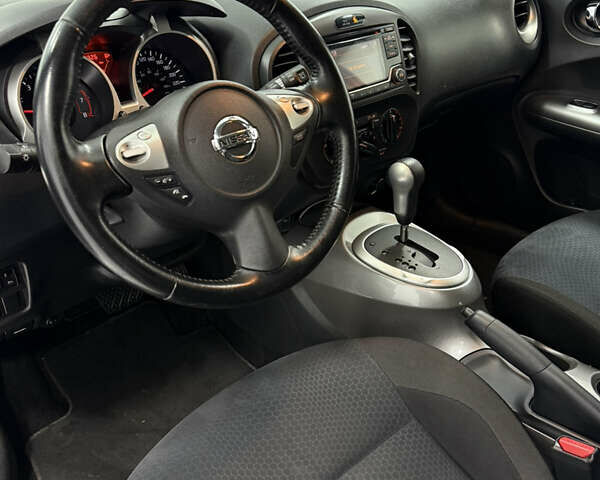 Белый Ниссан Жук, объемом двигателя 1.6 л и пробегом 140 тыс. км за 9900 $, фото 14 на Automoto.ua