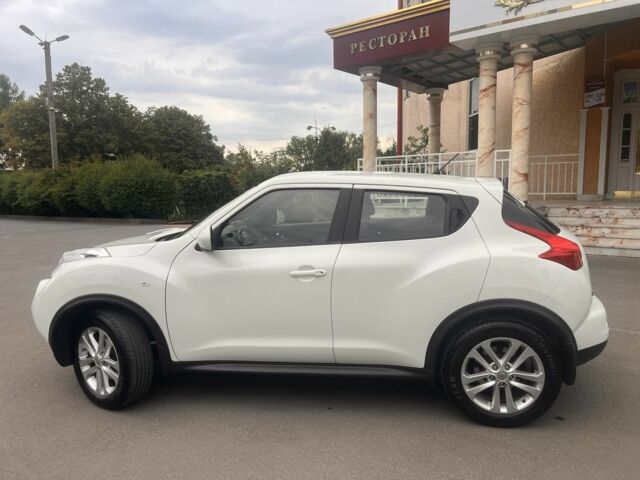 Белый Ниссан Жук, объемом двигателя 1.6 л и пробегом 144 тыс. км за 9000 $, фото 6 на Automoto.ua