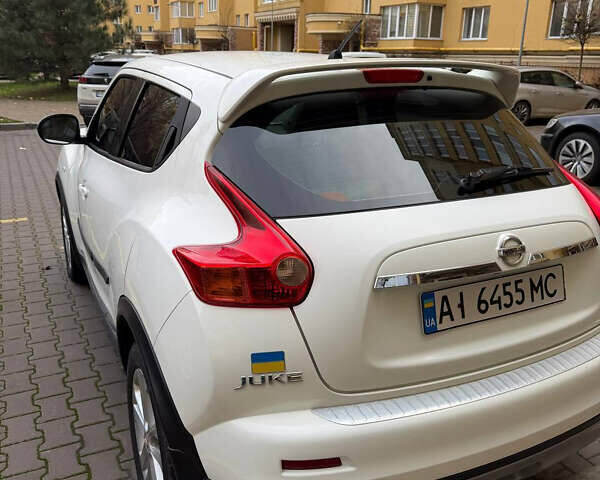 Белый Ниссан Жук, объемом двигателя 1.6 л и пробегом 130 тыс. км за 11600 $, фото 14 на Automoto.ua