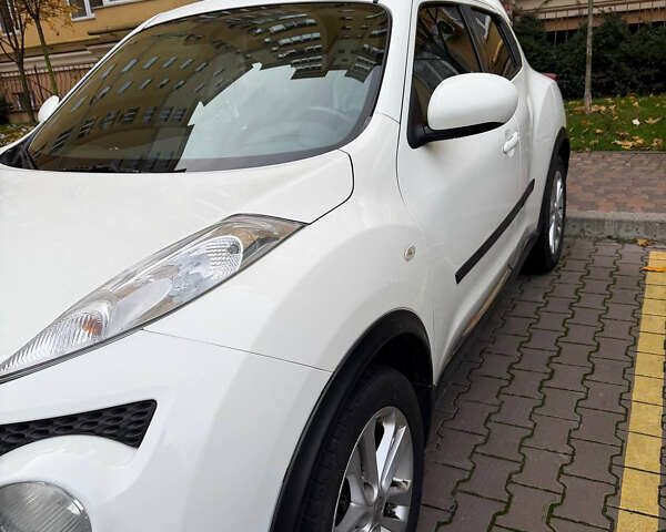 Белый Ниссан Жук, объемом двигателя 1.6 л и пробегом 130 тыс. км за 11600 $, фото 10 на Automoto.ua