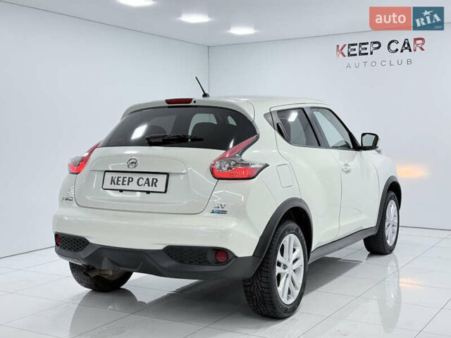 Белый Ниссан Жук, объемом двигателя 1.6 л и пробегом 140 тыс. км за 9900 $, фото 8 на Automoto.ua