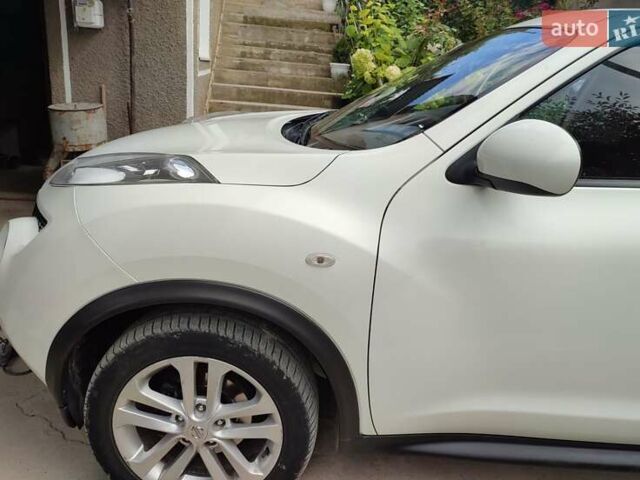 Белый Ниссан Жук, объемом двигателя 1.6 л и пробегом 158 тыс. км за 12300 $, фото 2 на Automoto.ua