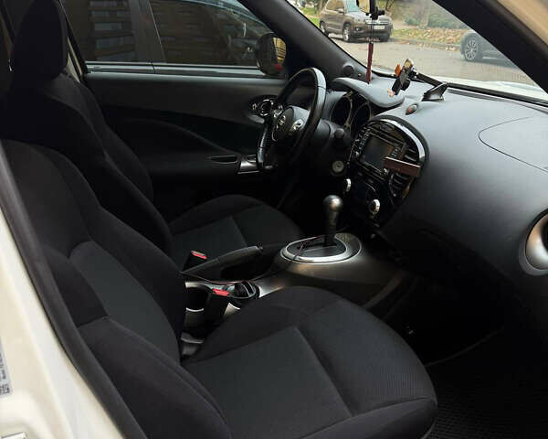 Белый Ниссан Жук, объемом двигателя 1.6 л и пробегом 130 тыс. км за 11600 $, фото 27 на Automoto.ua