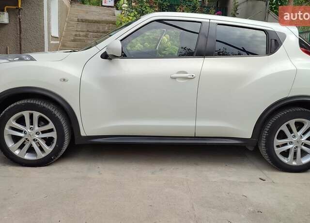 Белый Ниссан Жук, объемом двигателя 1.6 л и пробегом 158 тыс. км за 12300 $, фото 8 на Automoto.ua