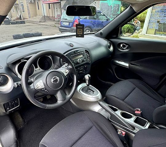 Белый Ниссан Жук, объемом двигателя 1.6 л и пробегом 157 тыс. км за 9399 $, фото 8 на Automoto.ua