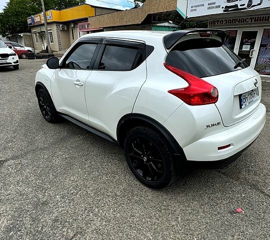 Белый Ниссан Жук, объемом двигателя 1.6 л и пробегом 157 тыс. км за 9399 $, фото 6 на Automoto.ua