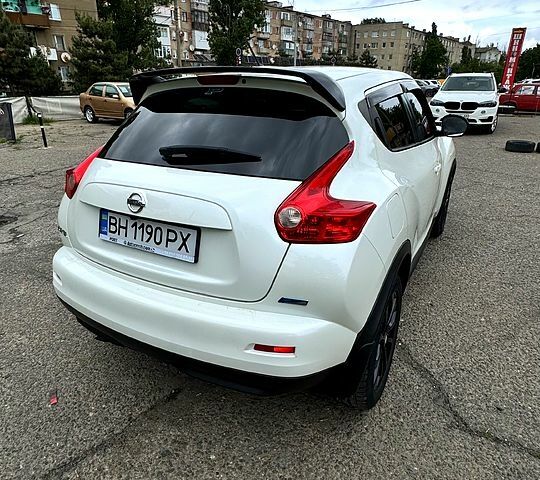 Белый Ниссан Жук, объемом двигателя 1.6 л и пробегом 157 тыс. км за 9399 $, фото 4 на Automoto.ua