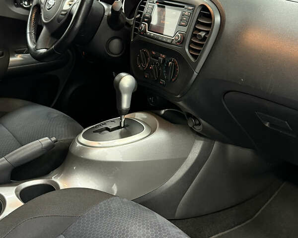 Белый Ниссан Жук, объемом двигателя 1.6 л и пробегом 140 тыс. км за 9900 $, фото 16 на Automoto.ua