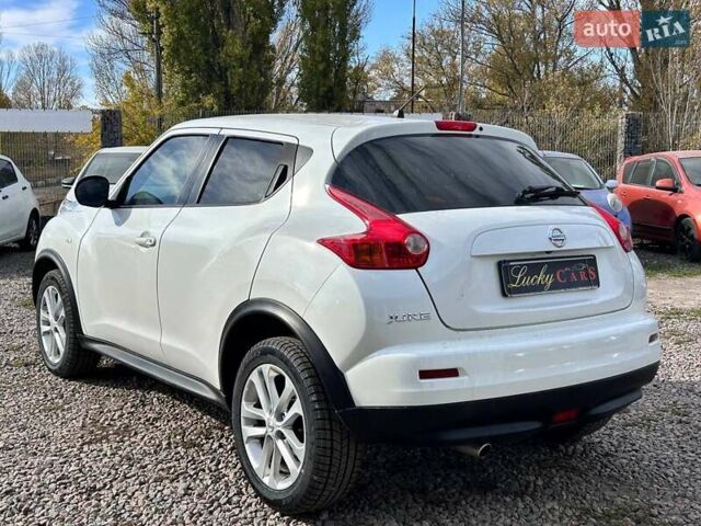 Белый Ниссан Жук, объемом двигателя 1.6 л и пробегом 152 тыс. км за 10200 $, фото 6 на Automoto.ua