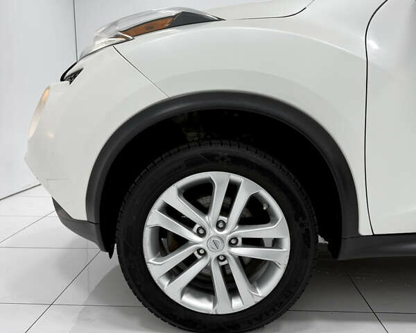 Белый Ниссан Жук, объемом двигателя 1.6 л и пробегом 140 тыс. км за 9900 $, фото 12 на Automoto.ua