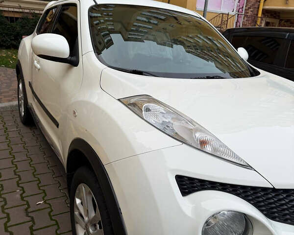 Белый Ниссан Жук, объемом двигателя 1.6 л и пробегом 130 тыс. км за 11600 $, фото 6 на Automoto.ua