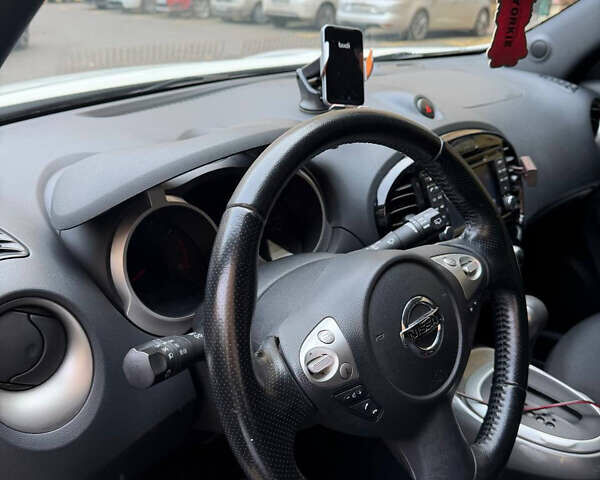 Белый Ниссан Жук, объемом двигателя 1.6 л и пробегом 130 тыс. км за 11600 $, фото 17 на Automoto.ua