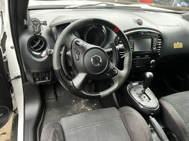 Белый Ниссан Жук, объемом двигателя 1.6 л и пробегом 99 тыс. км за 12800 $, фото 6 на Automoto.ua