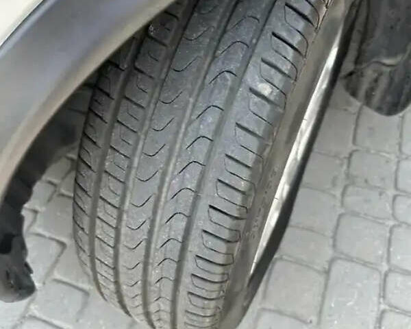 Белый Ниссан Жук, объемом двигателя 1.62 л и пробегом 155 тыс. км за 12500 $, фото 4 на Automoto.ua