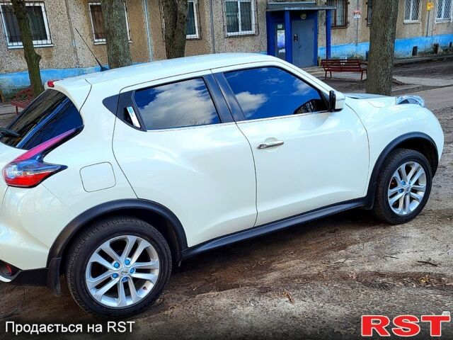 Белый Ниссан Жук, объемом двигателя 16 л и пробегом 118 тыс. км за 13000 $, фото 1 на Automoto.ua