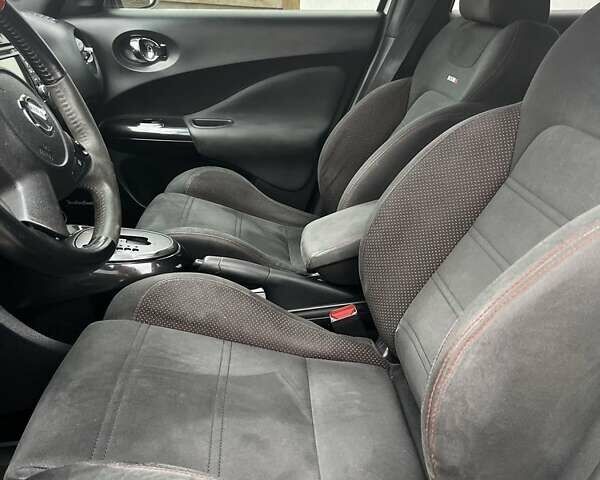 Белый Ниссан Жук, объемом двигателя 1.6 л и пробегом 99 тыс. км за 12800 $, фото 7 на Automoto.ua