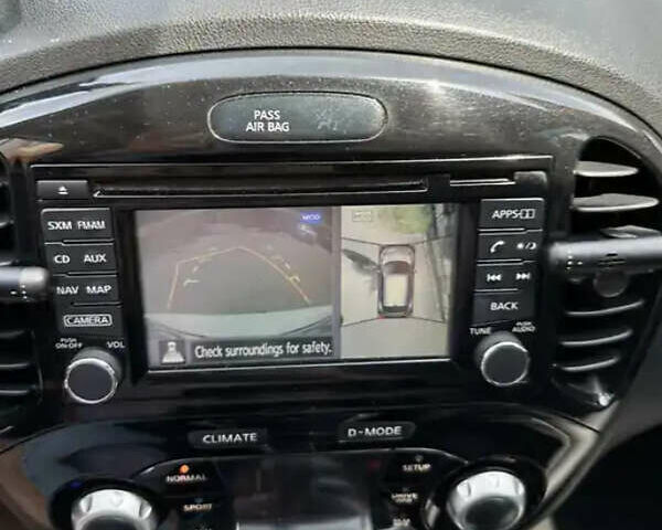 Белый Ниссан Жук, объемом двигателя 1.62 л и пробегом 155 тыс. км за 12500 $, фото 2 на Automoto.ua