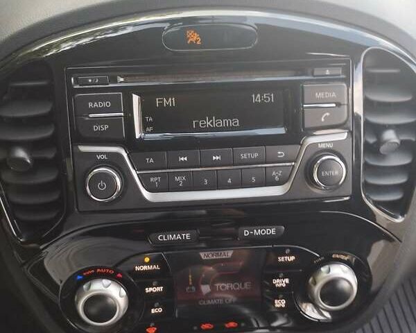 Белый Ниссан Жук, объемом двигателя 1.6 л и пробегом 40 тыс. км за 13500 $, фото 8 на Automoto.ua