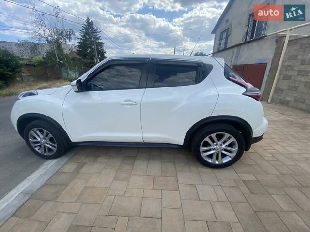 Белый Ниссан Жук, объемом двигателя 1.6 л и пробегом 65 тыс. км за 14000 $, фото 2 на Automoto.ua