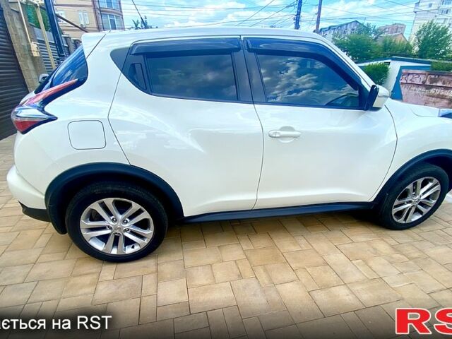 Белый Ниссан Жук, объемом двигателя 1.6 л и пробегом 65 тыс. км за 13900 $, фото 1 на Automoto.ua