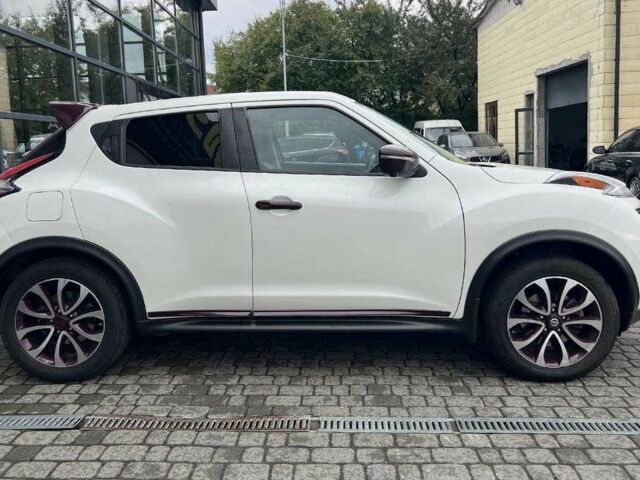 Белый Ниссан Жук, объемом двигателя 1.6 л и пробегом 86 тыс. км за 12200 $, фото 7 на Automoto.ua