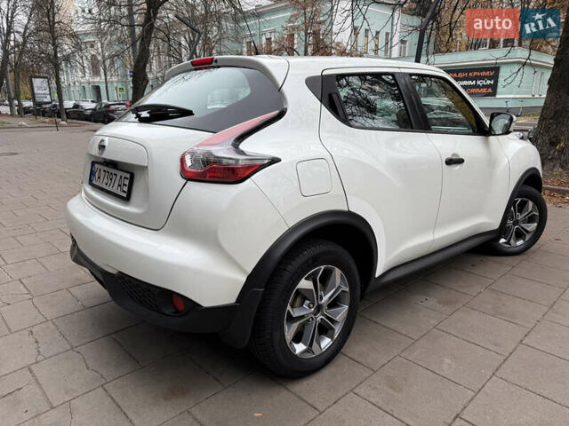 Белый Ниссан Жук, объемом двигателя 1.6 л и пробегом 90 тыс. км за 12900 $, фото 4 на Automoto.ua