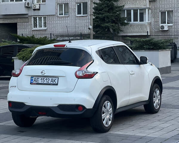 Белый Ниссан Жук, объемом двигателя 1.6 л и пробегом 94 тыс. км за 12700 $, фото 6 на Automoto.ua