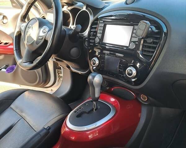 Белый Ниссан Жук, объемом двигателя 1.62 л и пробегом 92 тыс. км за 14000 $, фото 4 на Automoto.ua