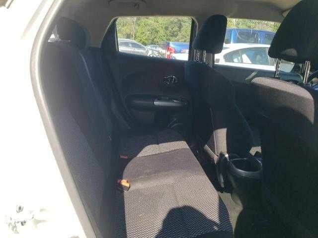 Белый Ниссан Жук, объемом двигателя 1.6 л и пробегом 86 тыс. км за 999 $, фото 10 на Automoto.ua