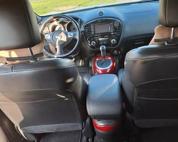 Белый Ниссан Жук, объемом двигателя 1.62 л и пробегом 92 тыс. км за 14000 $, фото 7 на Automoto.ua