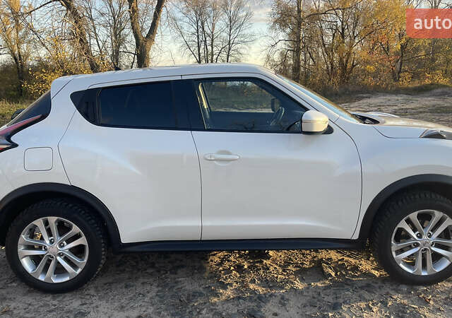 Белый Ниссан Жук, объемом двигателя 1.6 л и пробегом 81 тыс. км за 13200 $, фото 5 на Automoto.ua