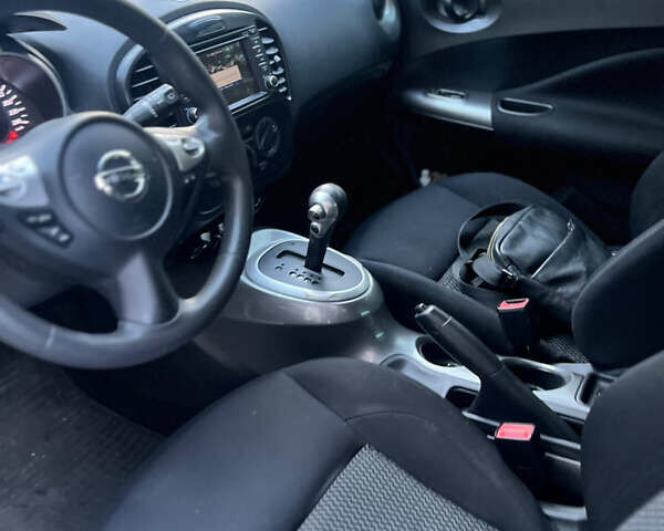 Белый Ниссан Жук, объемом двигателя 1.6 л и пробегом 94 тыс. км за 12700 $, фото 10 на Automoto.ua