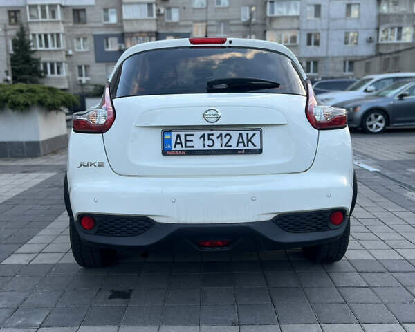 Белый Ниссан Жук, объемом двигателя 1.6 л и пробегом 94 тыс. км за 12700 $, фото 7 на Automoto.ua